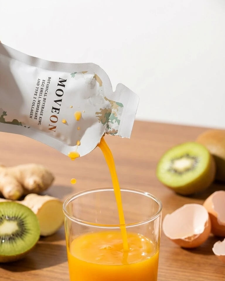 Liquid supplement poured into a glass beside fruit and capsules